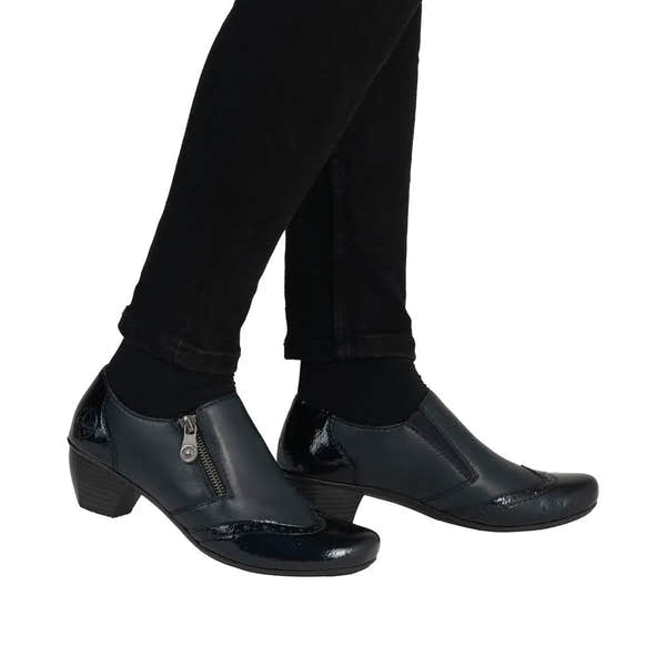 Rieker 41757-15 women's blue leather side zip ankle boots with block heel and decorative zipper detail.