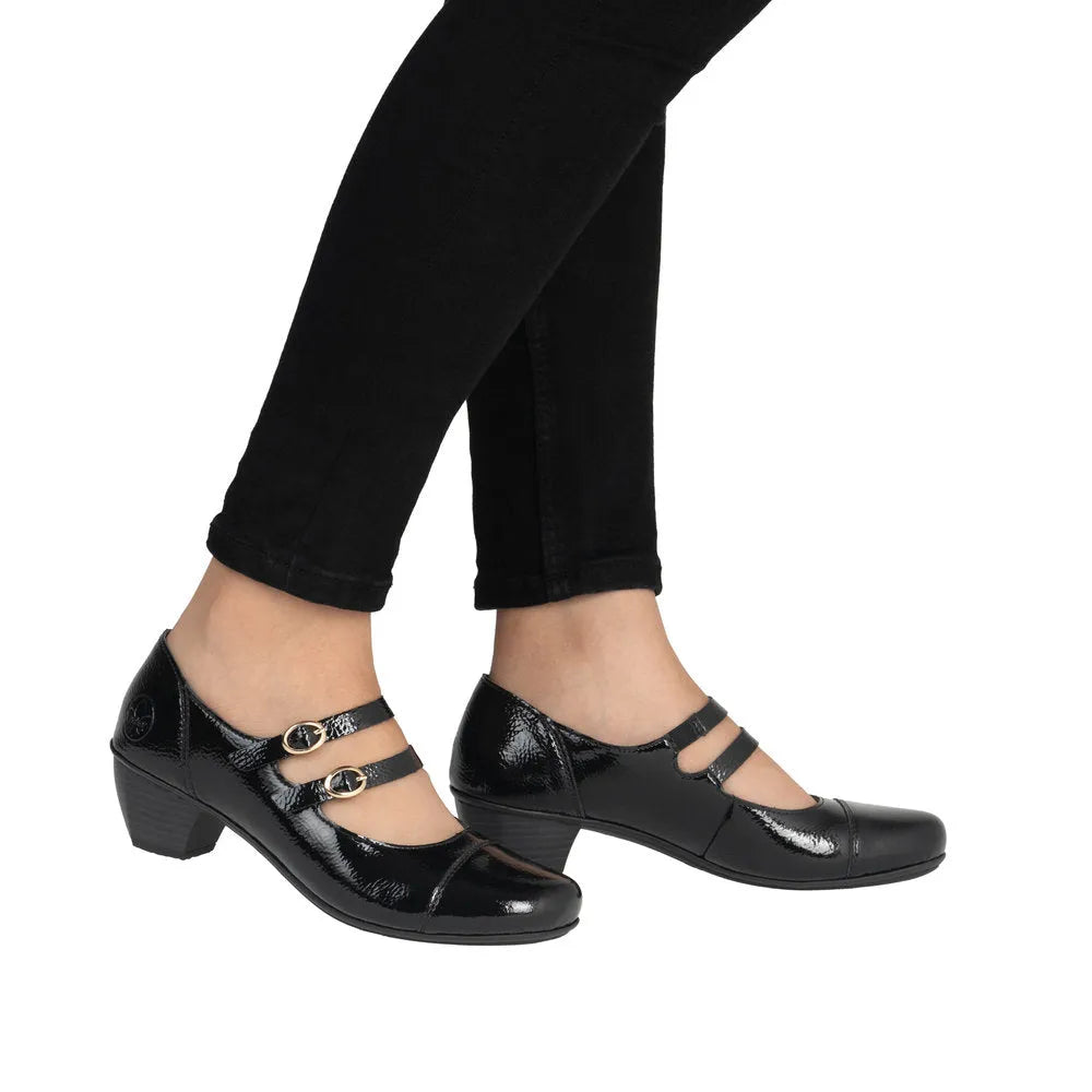 Rieker 41758-00 black patent leather ladies' buckle heels with double straps and low block heel.