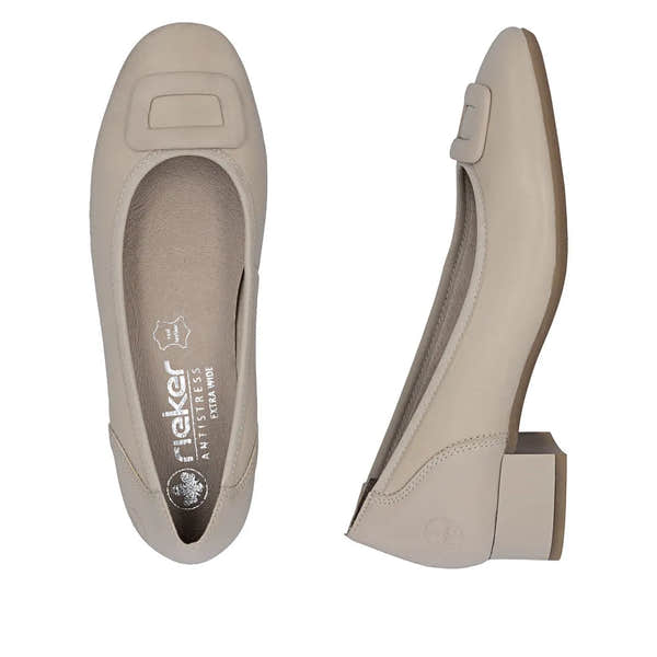 Beige leather women's wide-fit elasticated slip-on shoes with square ornament, chunky heel, and cushioned interior.