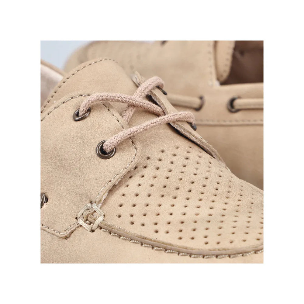 Rieker 43800-60 women's beige marble slip-on shoes with perforated design and lace-up detail.