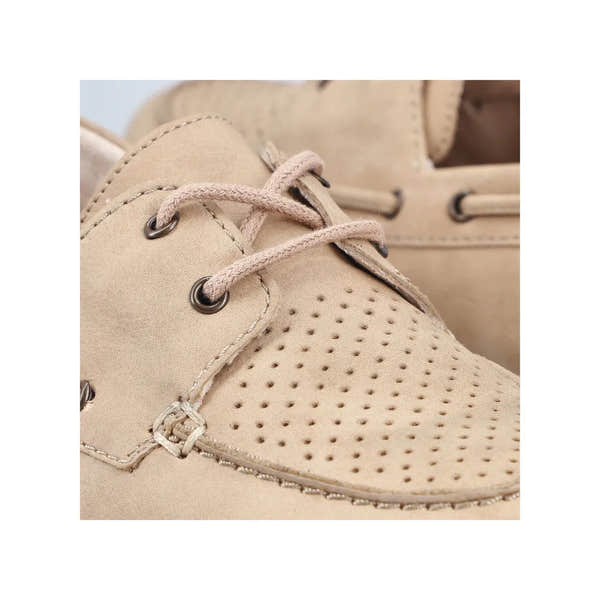 Rieker 43800-60 women's beige marble slip-on shoes with perforated design and lace-up detail.