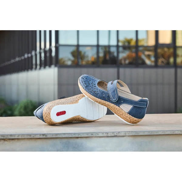 Navy blue touch fastening ladies' shoes with cut-out design, cork sole, and cushioned interior.