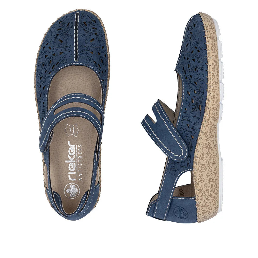 Navy blue leather touch-fastening ladies shoes with cut-out floral design, beige insole, and textured beige sole.