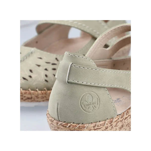 Green leather touch-fastening wedge shoes with perforated design and woven platform sole.