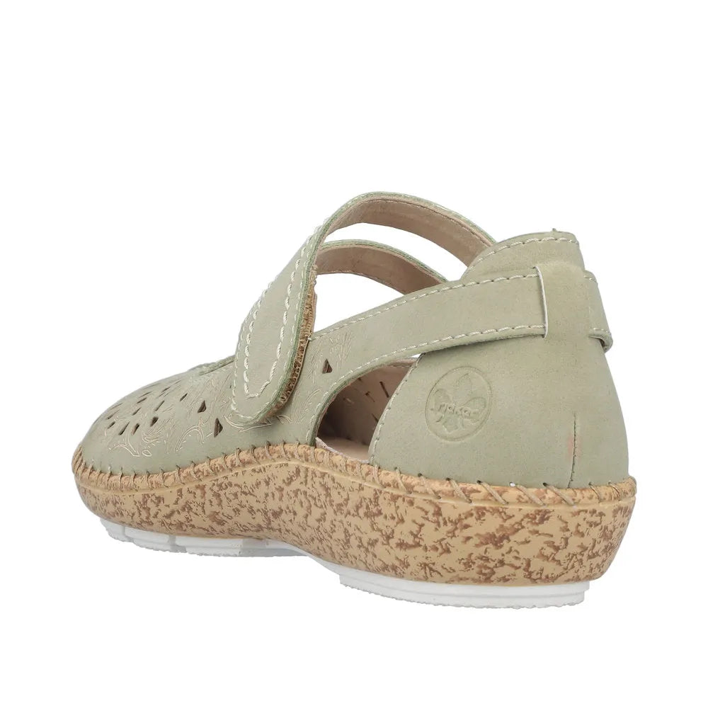 Green leather shoes with touch fastening straps, perforated upper, and textured beige outsole.