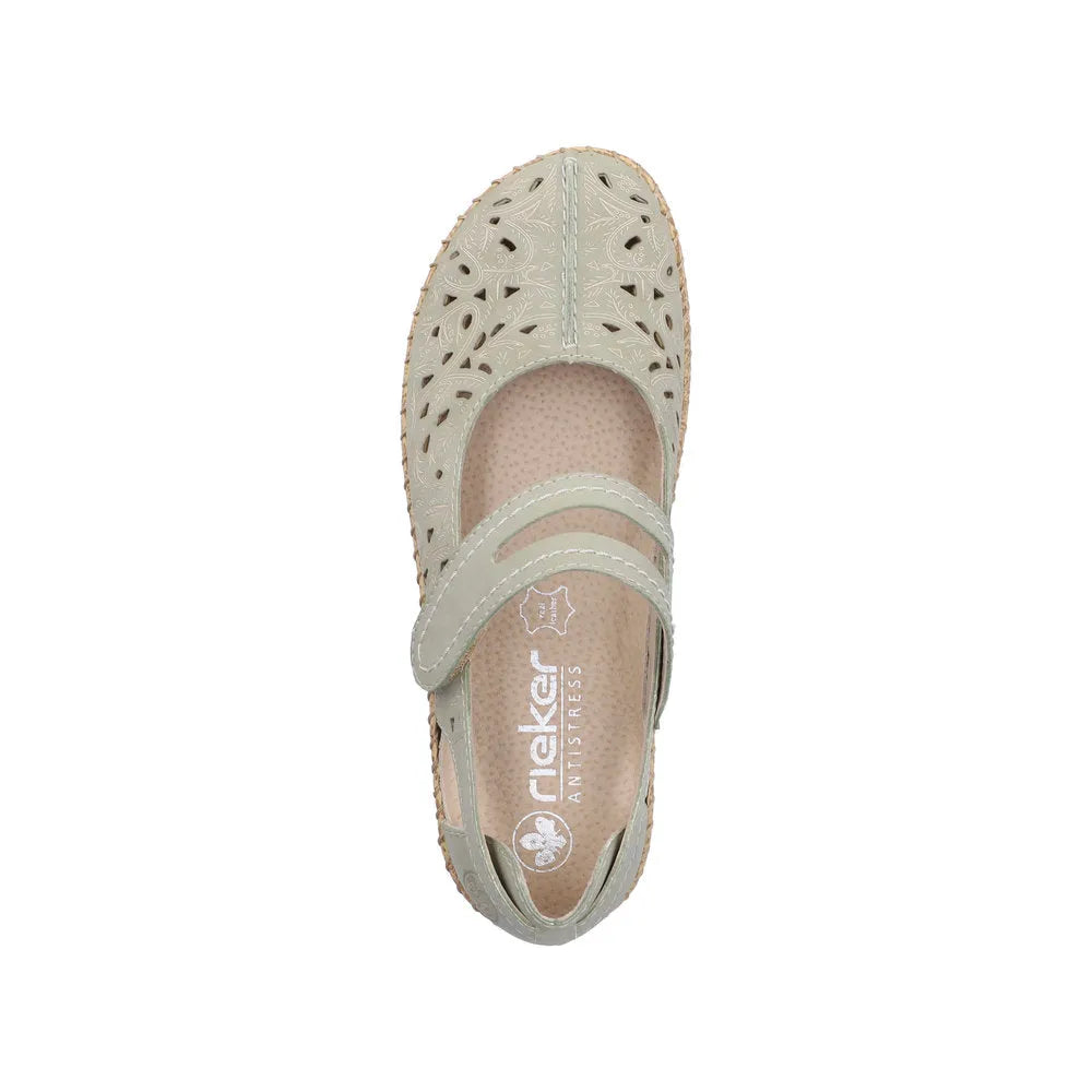 Green leather women's touch fastening shoes with perforated, decorative cutouts, beige insole, and cushioned interior.
