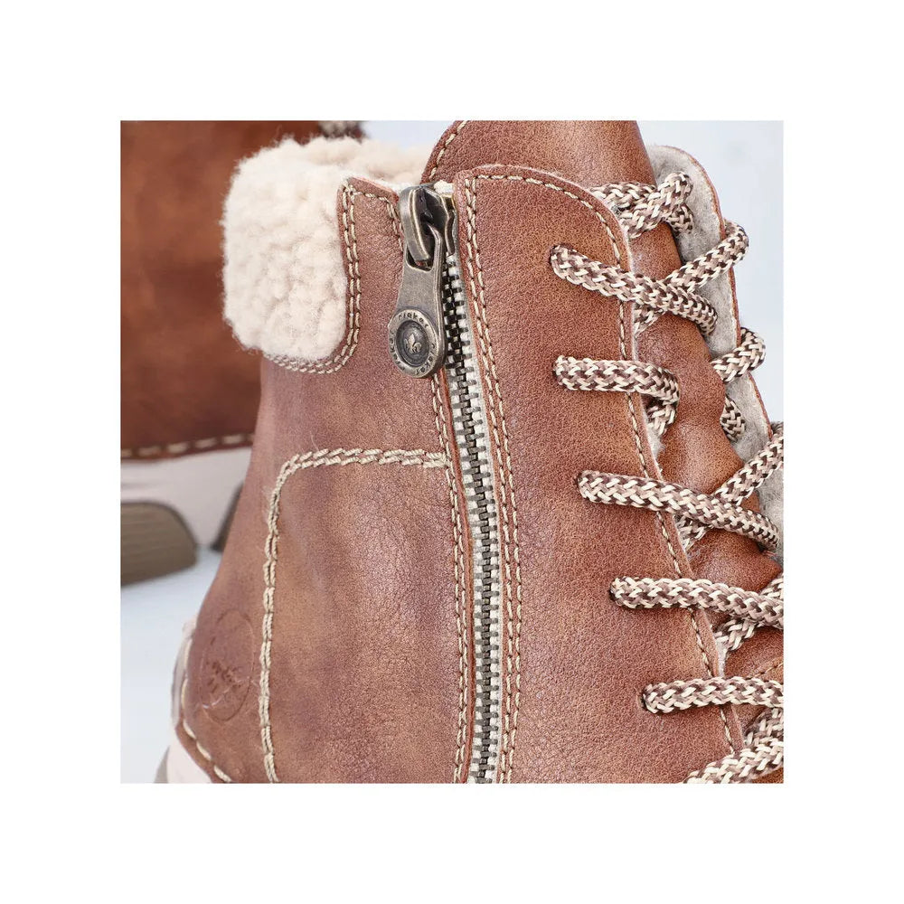 Rieker 45931-24 women's brown ankle boots with lace-up and side zipper, faux shearling collar, and detailed stitching.