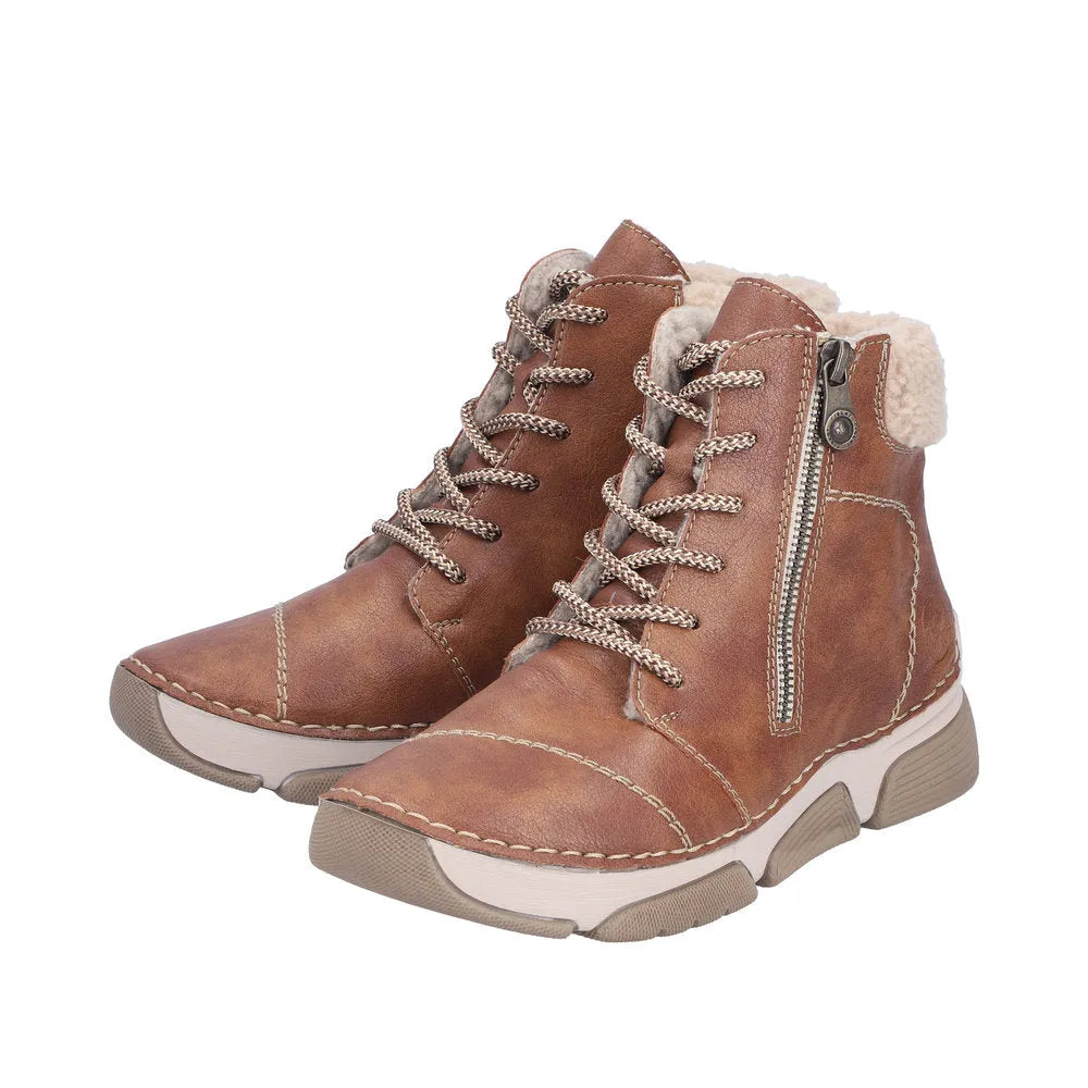 Rieker 45931-24 ladies brown ankle boots with lace-up and side zipper, faux shearling lining, and slip-resistant sole.