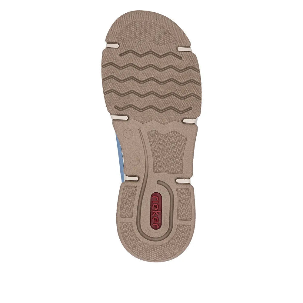 Light blue lace-up shoe with a textured rubber sole, featuring beige and red accents, designed for comfort and style.