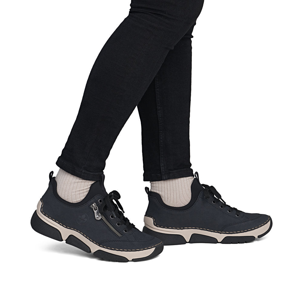 Rieker 45973-17 women's navy/black elasticated shoes, on-foot lifestyle view.