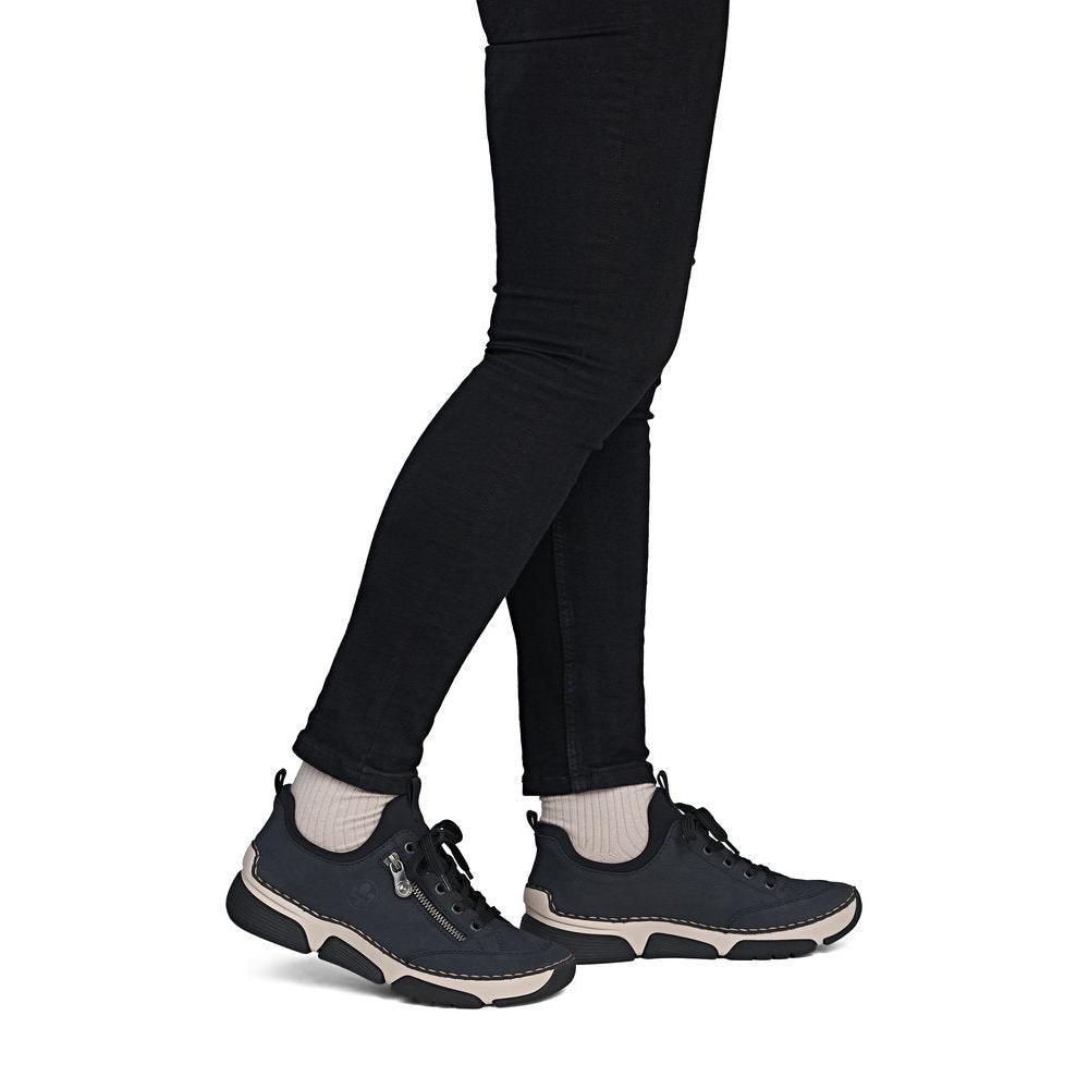Rieker 45973-17 women's navy/black elasticated shoes, on-foot lifestyle view.
