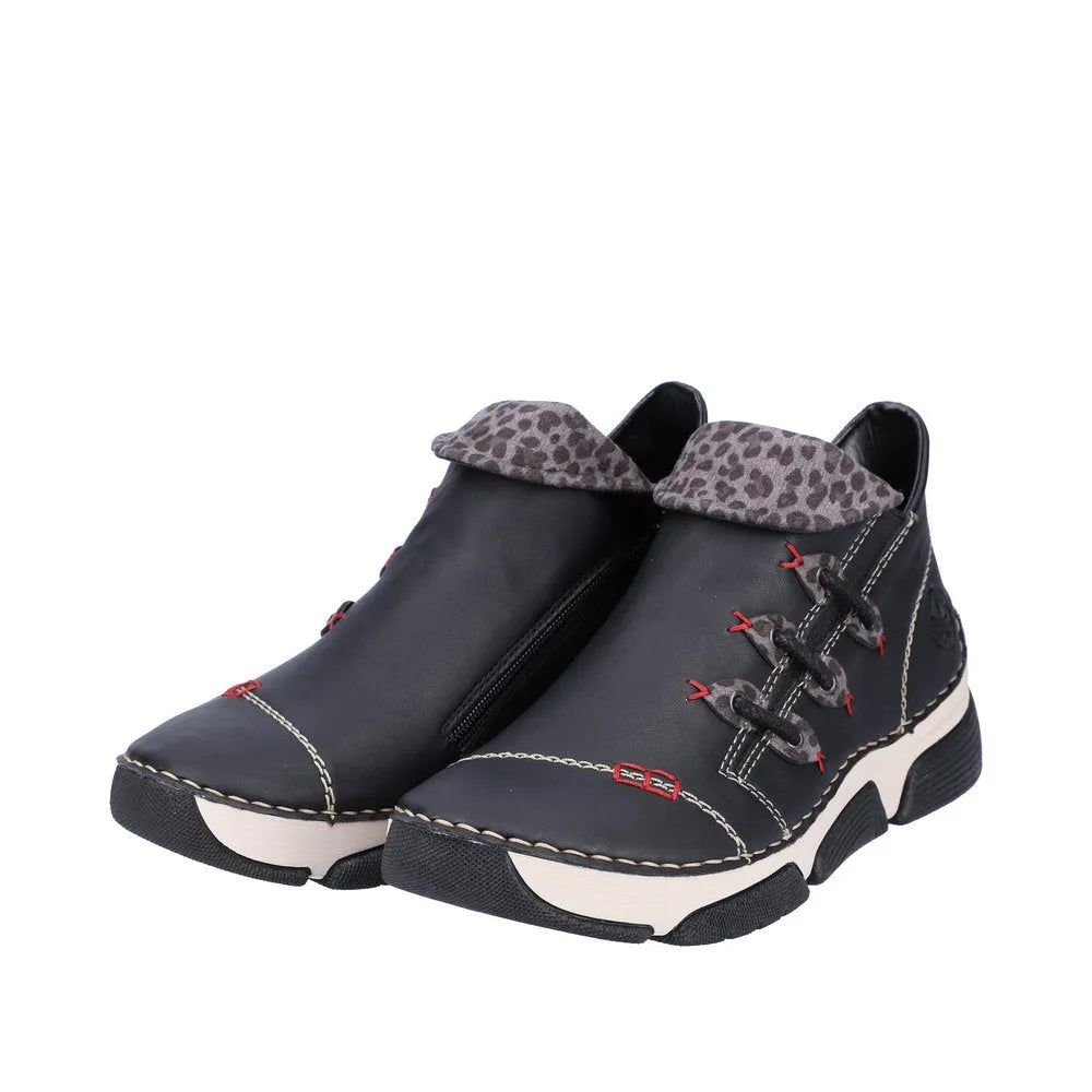 Rieker 45983-00 women's black ankle boots with side zip, leopard print collar, chunky sole, and detailed stitching.