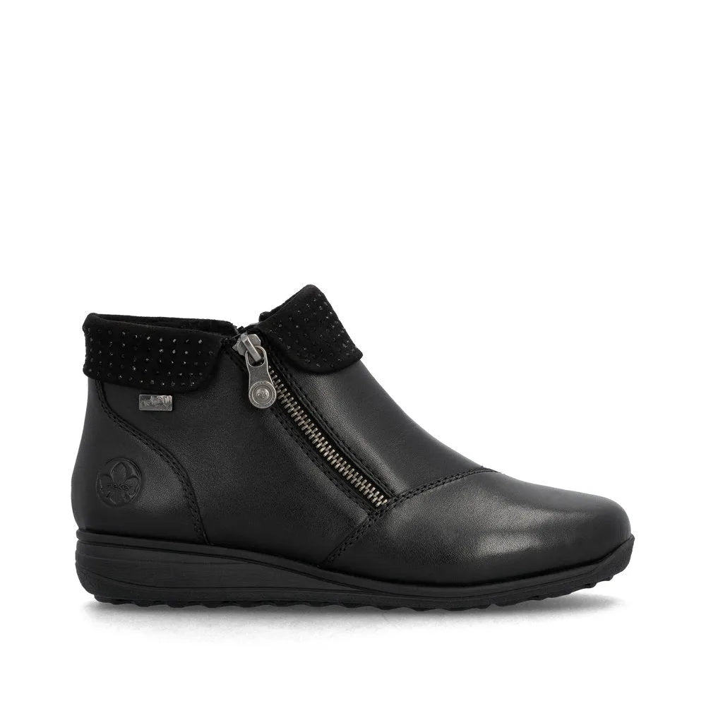 Rieker 47252-00 women's black leather water-resistant ankle boots with twin zippers and a textured collar.