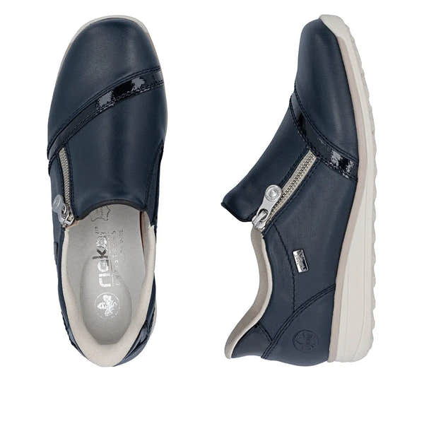 Rieker 47264-14 women's navy water-resistant leather side zip shoes with wide fit and white soles.