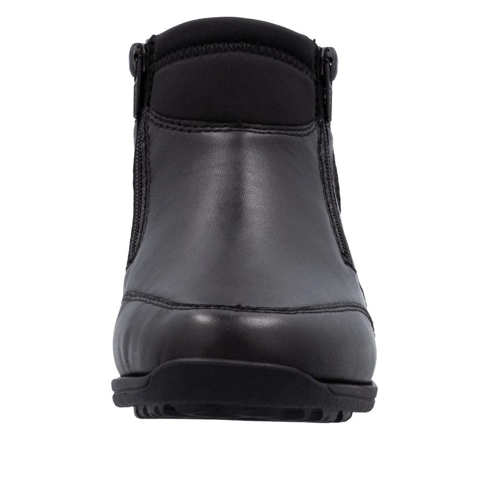 Rieker 47270-00 women's black leather water-resistant ankle boots with twin zippers and rugged sole.