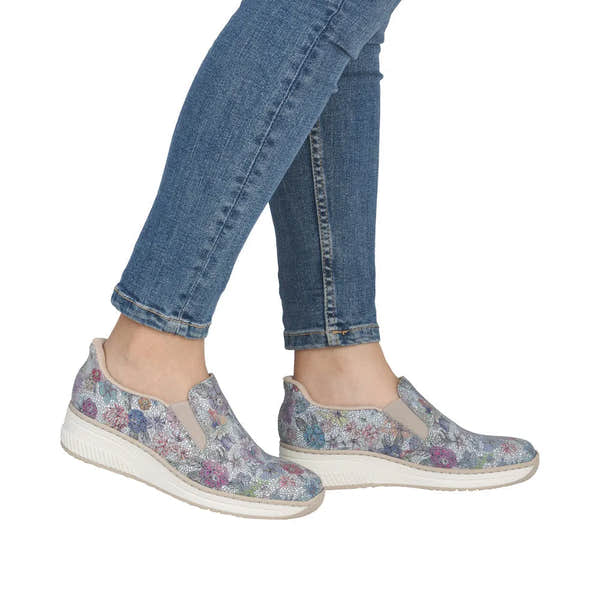 Rieker 48761-91 ladies multi-colored leather elasticated slip-on shoes with floral pattern and white rubber sole.