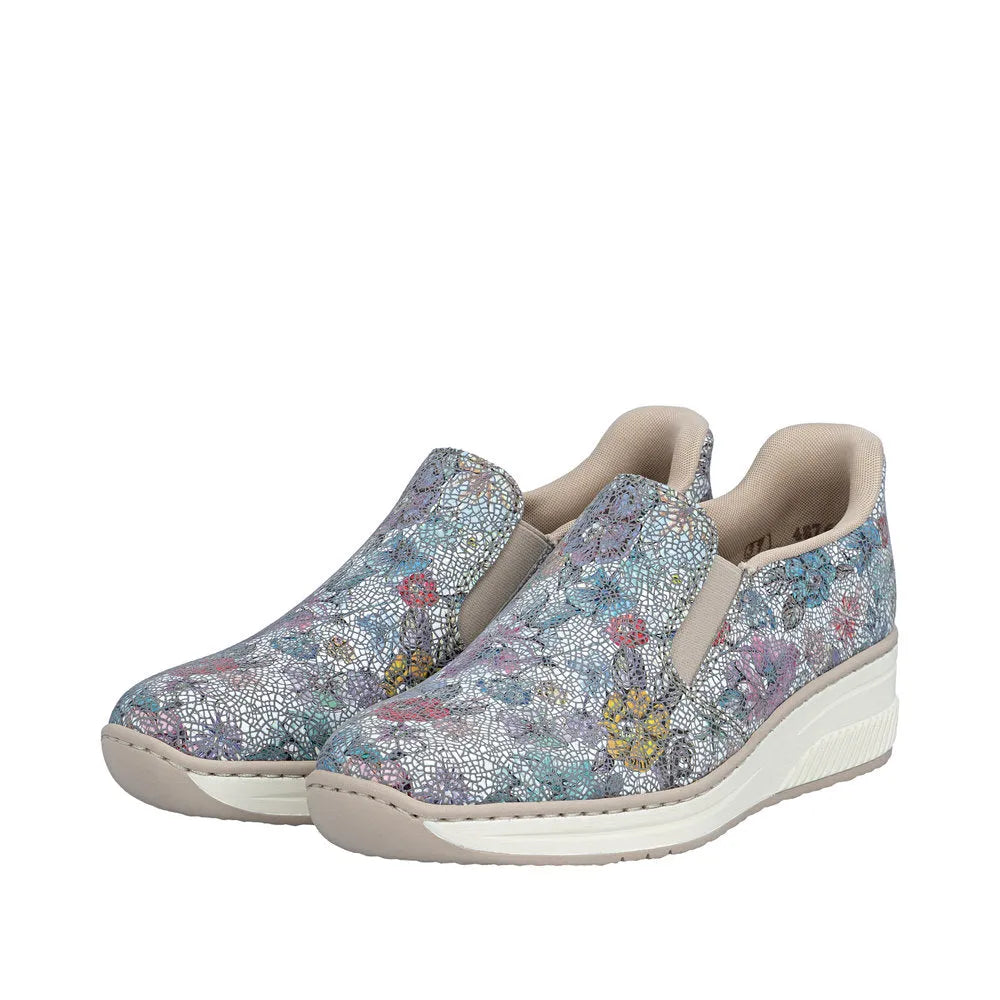Rieker 48761-91 ladies multi-colored leather elasticated slip-on shoes with floral patterns and cushioned beige interiors.