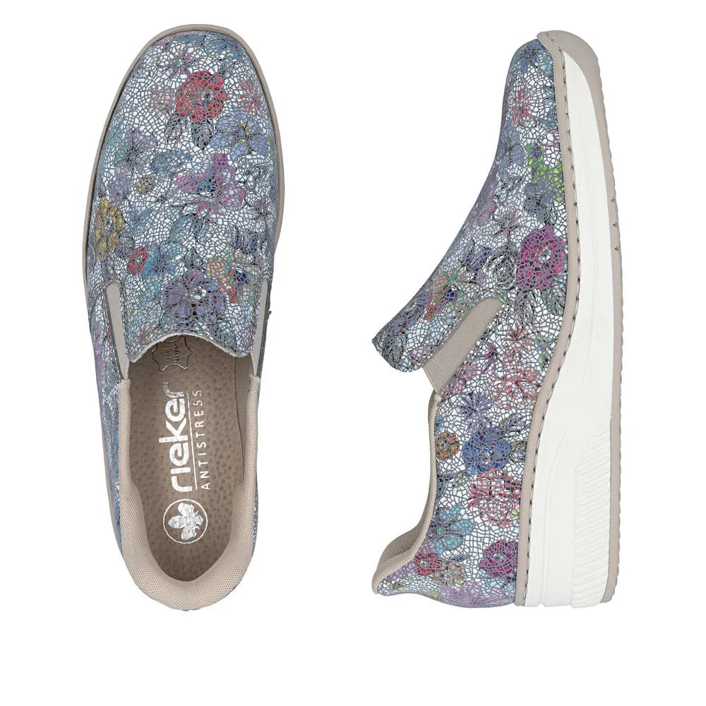 Rieker 48761-91 women's multi-colored leather slip-on shoes with elastic sides and white soles.