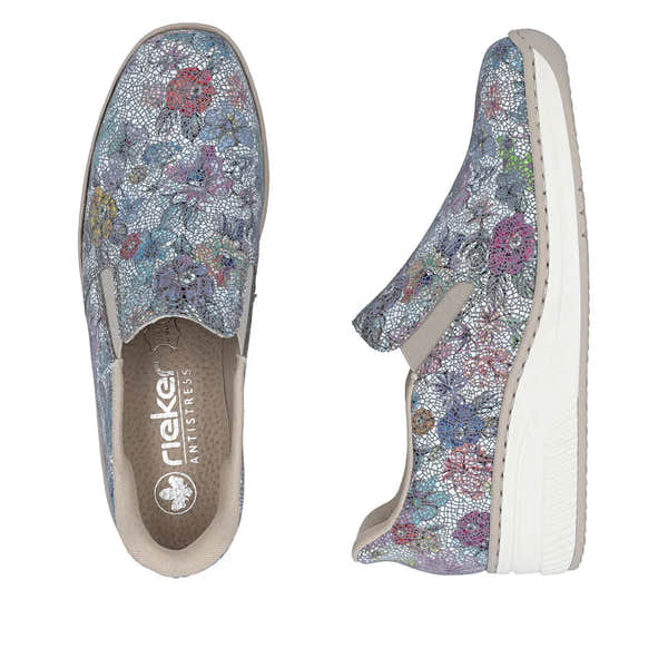 Rieker 48761-91 women's multi-colored leather slip-on shoes with elastic sides and white soles.