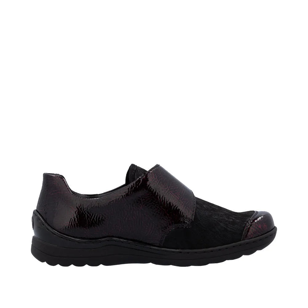 Rieker 48951-35 women's red touch fastening shoes with black accents, slip-on design, comfortable sole, and stylish finish.