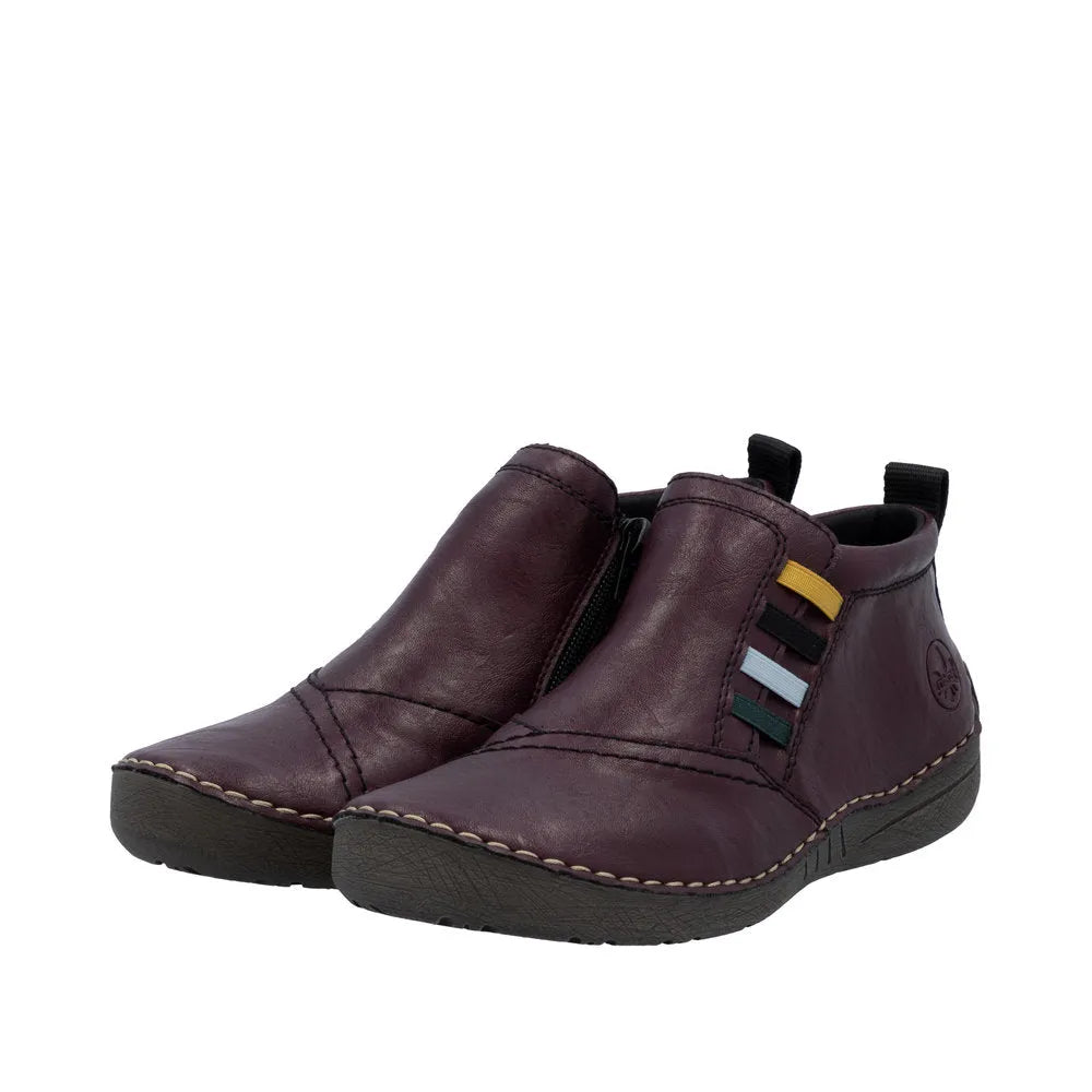 Rieker 52584-30 women's burgundy ankle boots with side zipper, slip-on design, and colorful strap accents, lightweight and comfortable.