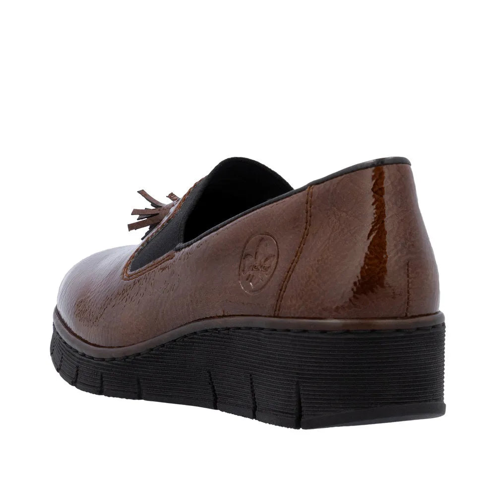 Rieker 53751-24 women's brown slip-on shoes with black elastic side panels and textured sole.