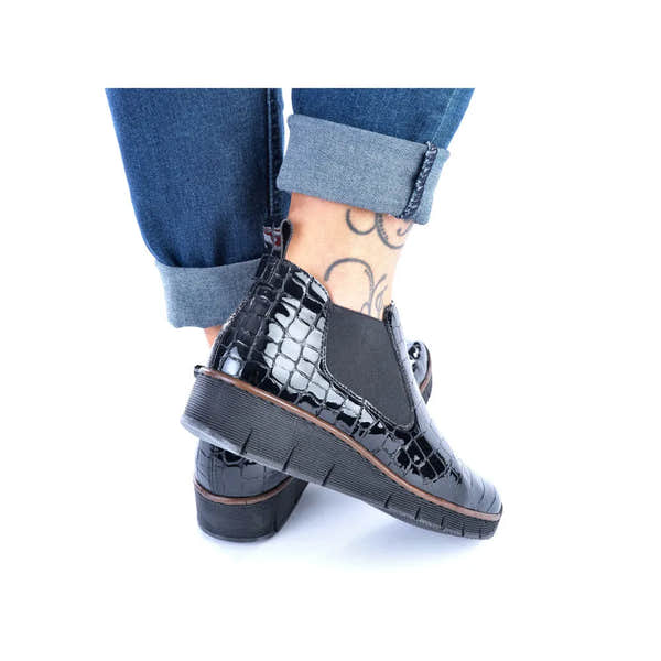 Rieker 53794-01 women's black croc leather ankle boots with pull-on style and chunky sole.