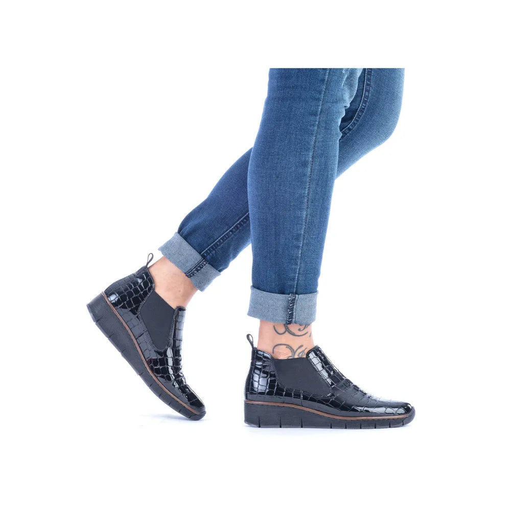 Rieker 53794-01 Ladies Black Croc Leather Pull-On Ankle Boots, stylish slip-on boots with textured crocodile pattern, low heel, ideal for everyday wear.