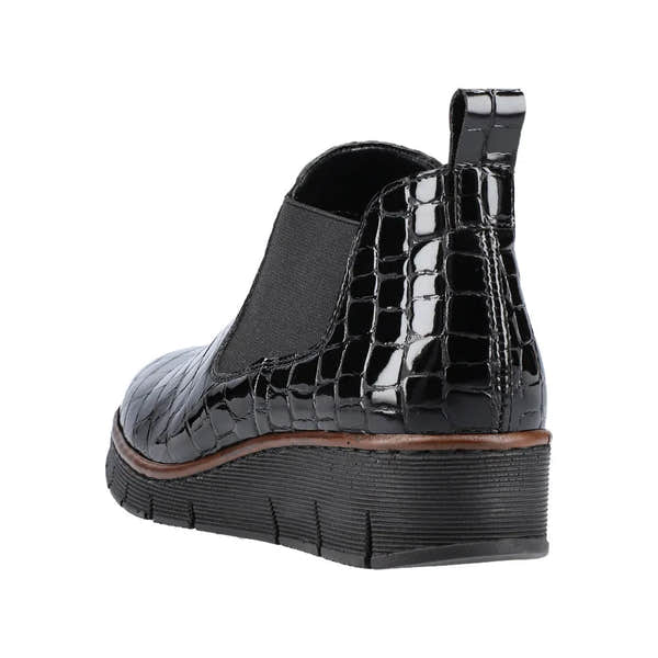 Rieker 53794-01 women's black crocodile leather pull-on ankle boots with low wedge heel and slip-on design.