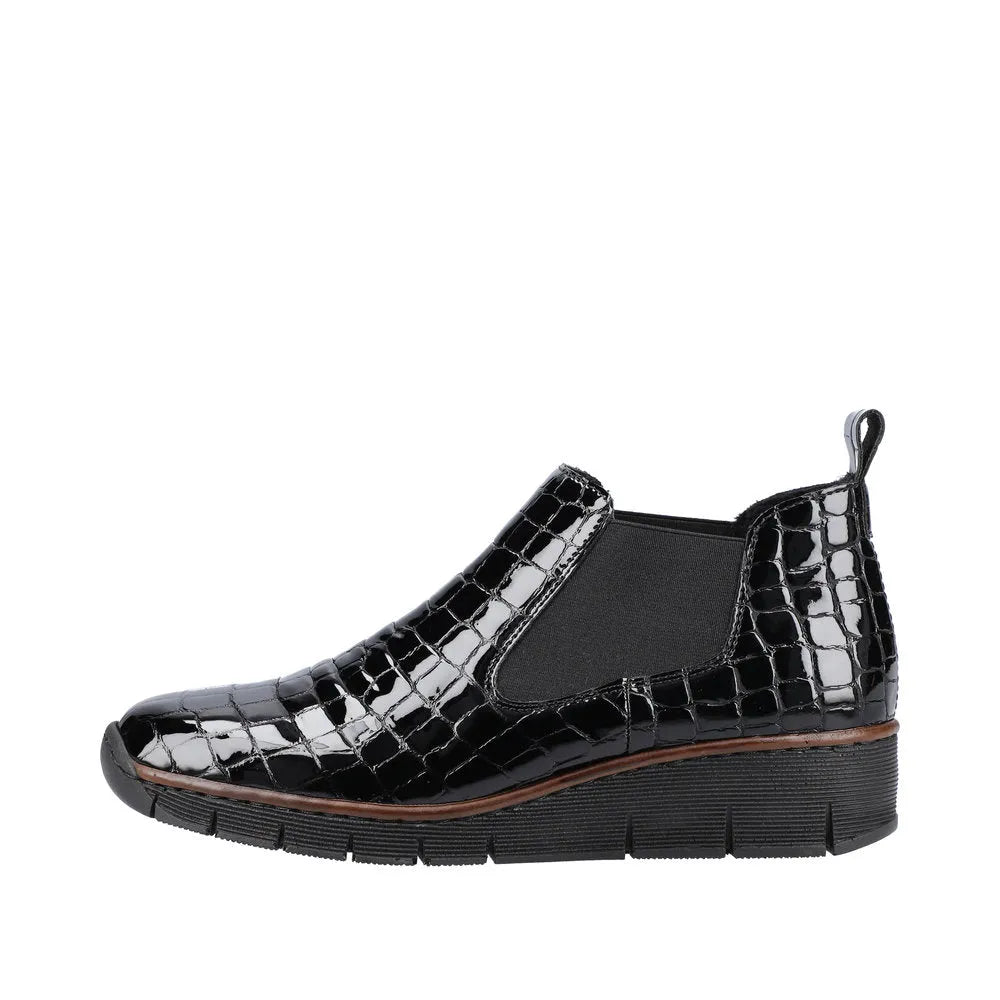 Rieker 53794-01 women's black crocodile leather slip-on ankle boots with pull tabs and textured sole.