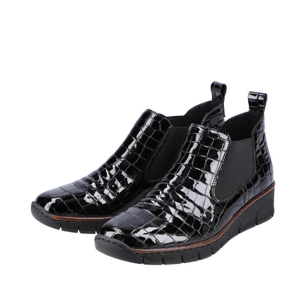 Rieker 53794-01 ladies black crocodile leather pull-on ankle boots with elastic side panels and chunky sole.