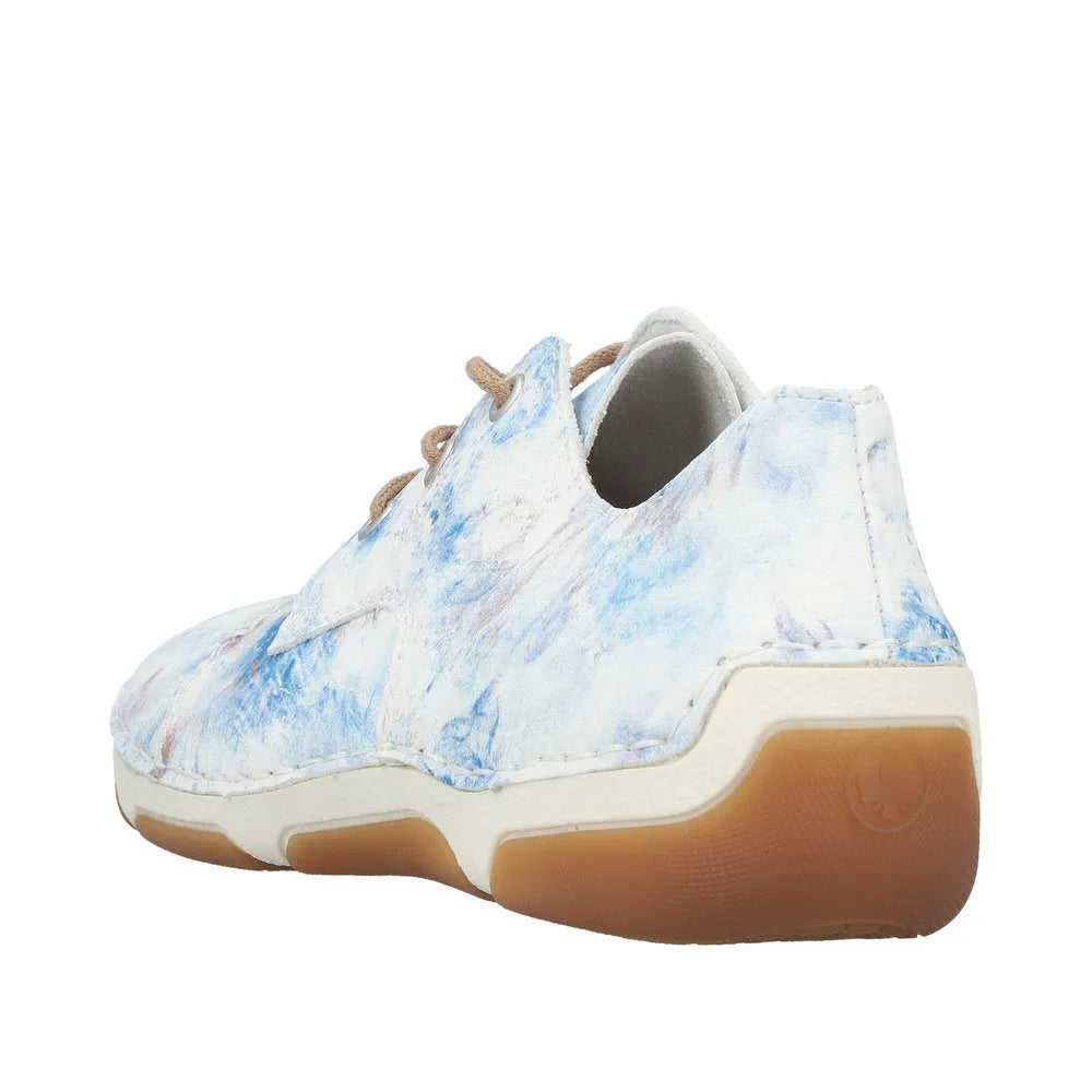 Rieker 55920-90 women's blue multi lace-up sneakers with abstract paint design and rubber sole.