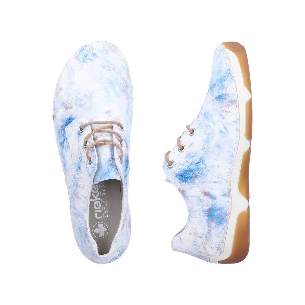 Rieker 55920-90 women's blue multi lace-up shoes with a marble-like pattern and tan rubber sole.