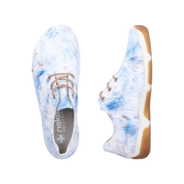 Rieker 55920-90 women's blue multi lace-up shoes with a marble-like pattern and tan rubber sole.