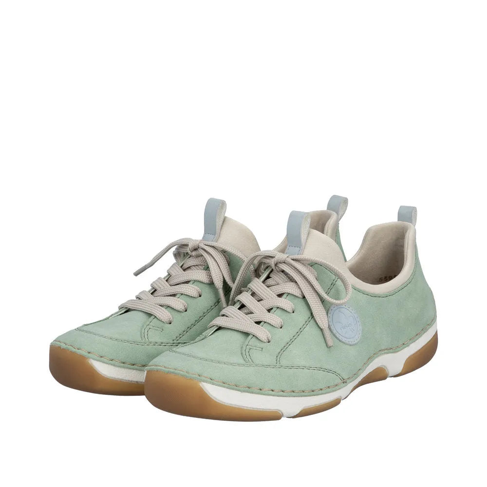 Mint green lace-up shoes with beige accents, cushioned collar, and gum outsole, designed for comfort and casual wear.