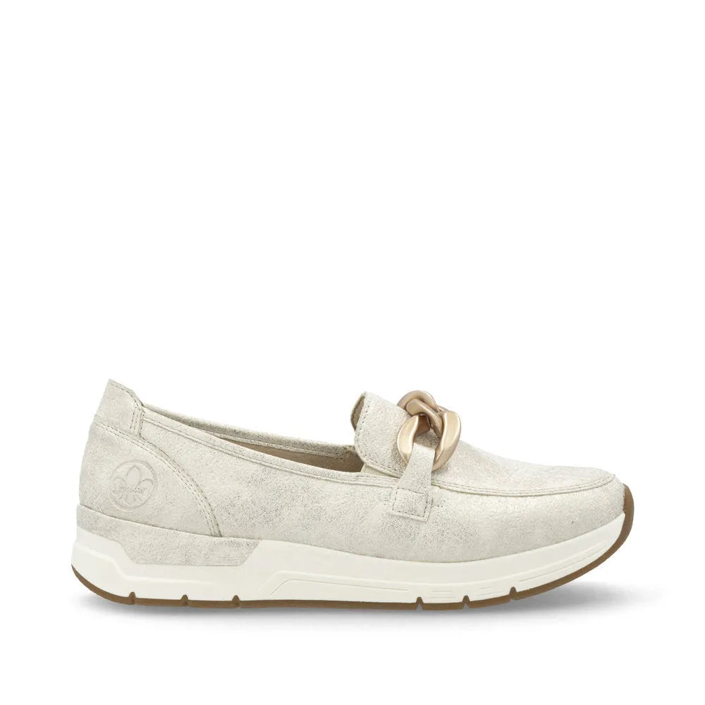 Rieker 58944-61 beige slip-on women's shoes with decorative front knot, cushioned sole, and casual slip-on design.