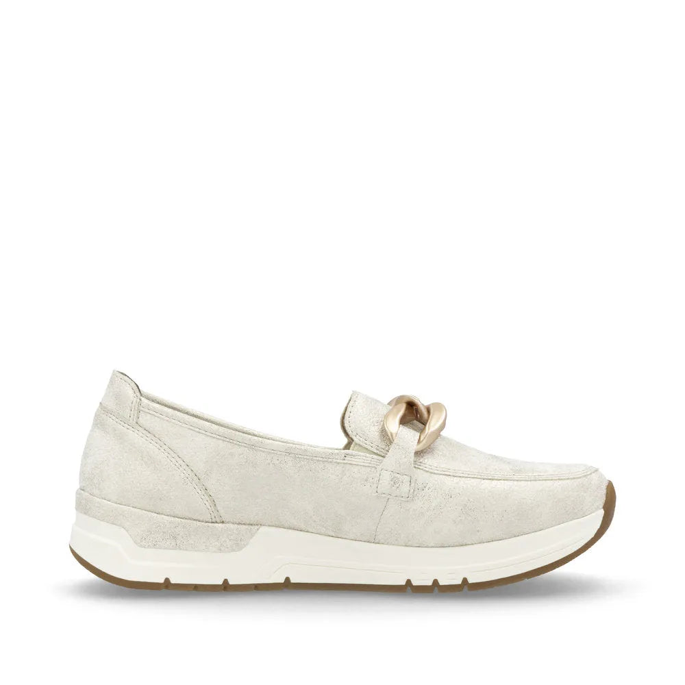 Rieker 58944-61 beige slip-on ladies shoes with decorative metallic chain detail and cushioned sole.