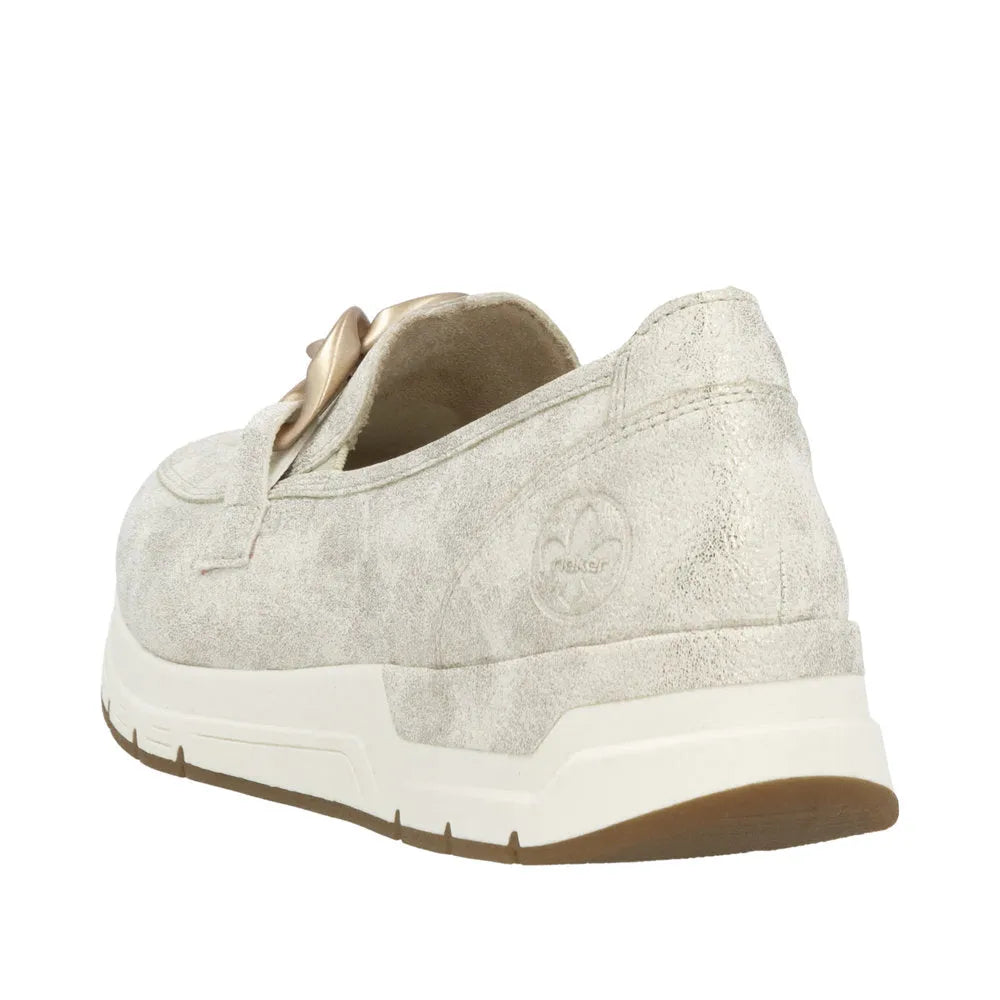 Rieker 58944-61 women's beige slip-on casual shoes with a cushioned sole and decorative bow detail.
