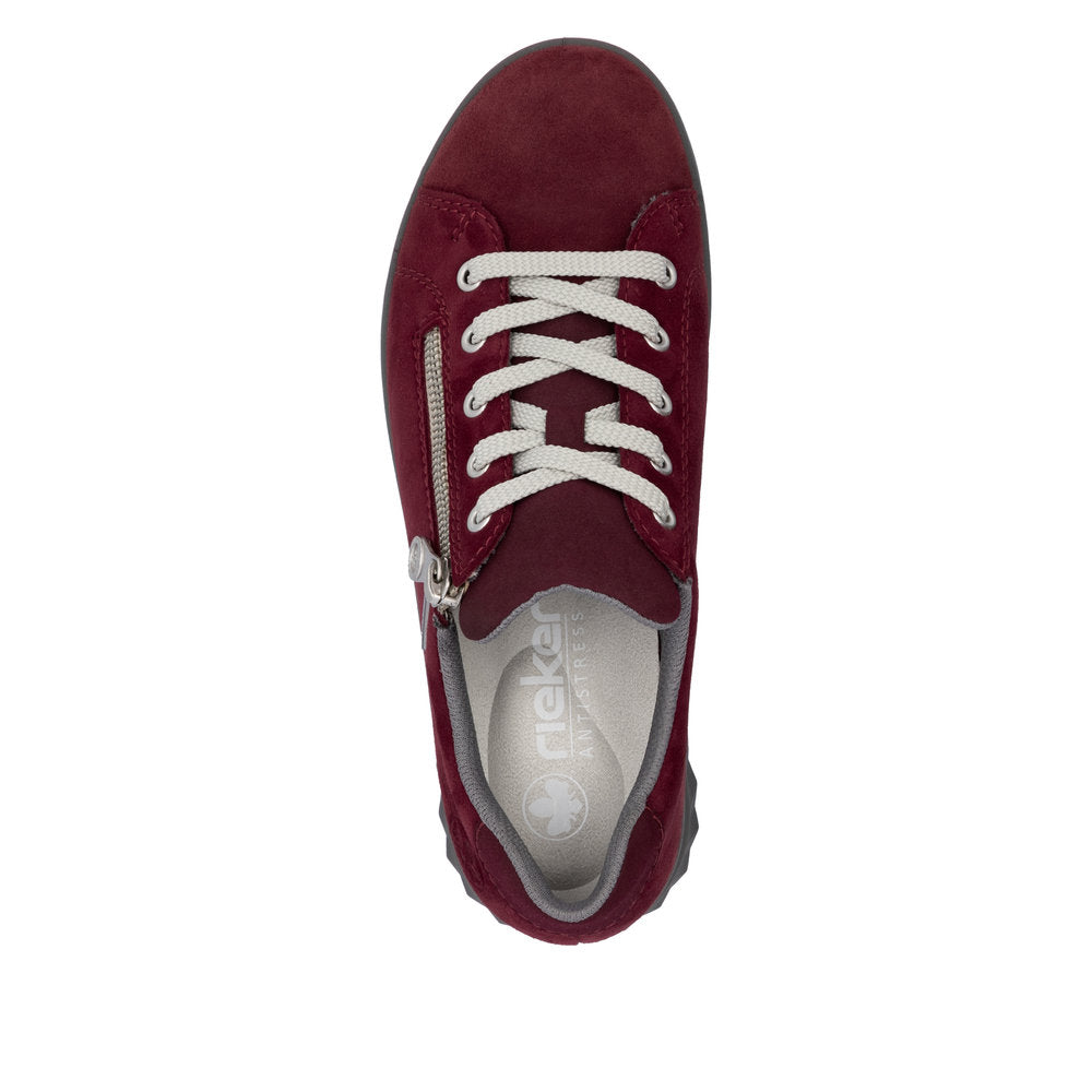 Rieker 59000-35 women's Bordeaux suede water-resistant side zip shoes with white laces, cushioned interior, and stylish design.
