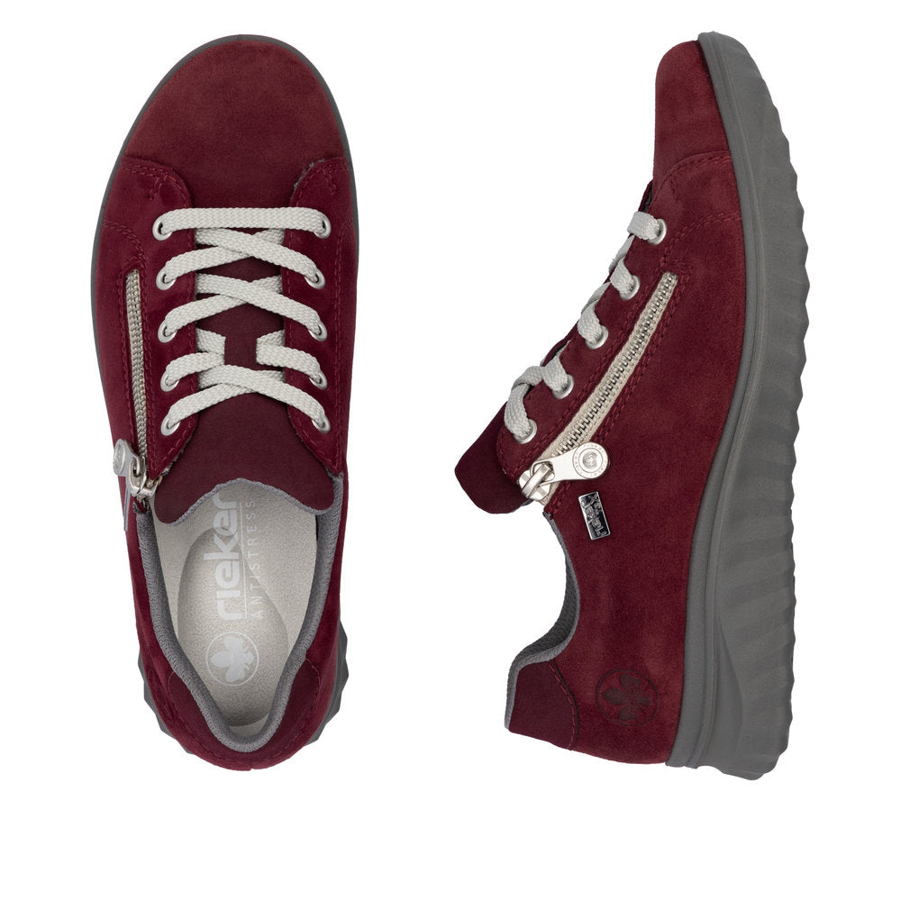 Rieker 59000-35 women's Bordeaux suede water-resistant side zip shoes with white laces and gray sole.