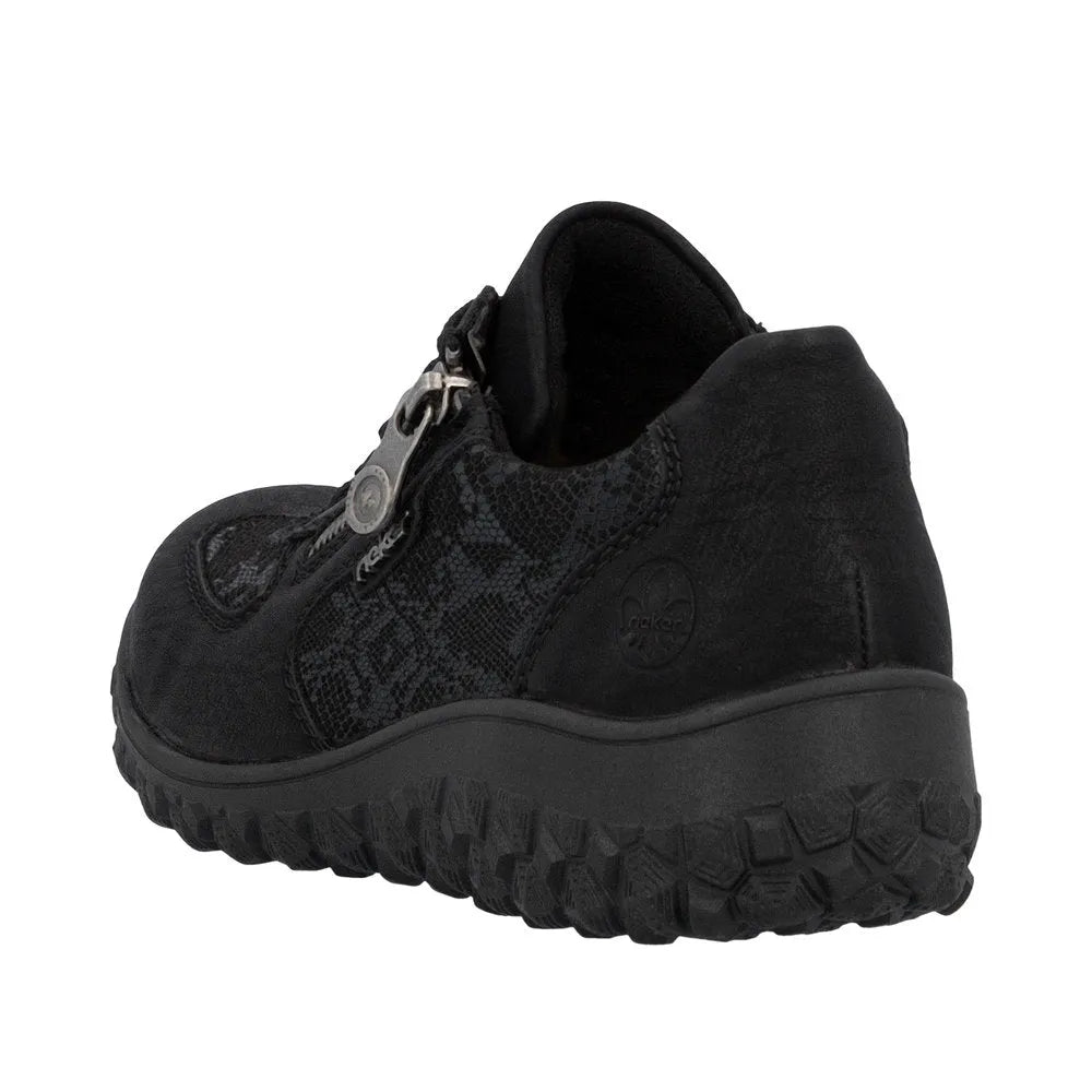 Rieker 59501-00 women's black trainers with zip and lace-up closure, textured fabric, cushioned sole, and rugged outsole.