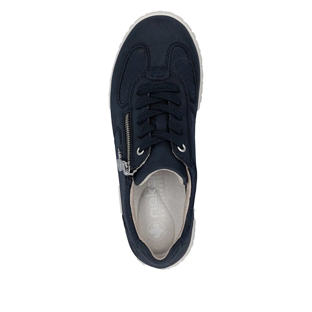 Navy blue Rieker 59501-14 women's wide shoes with lace-up front, side zipper, and beige interior.