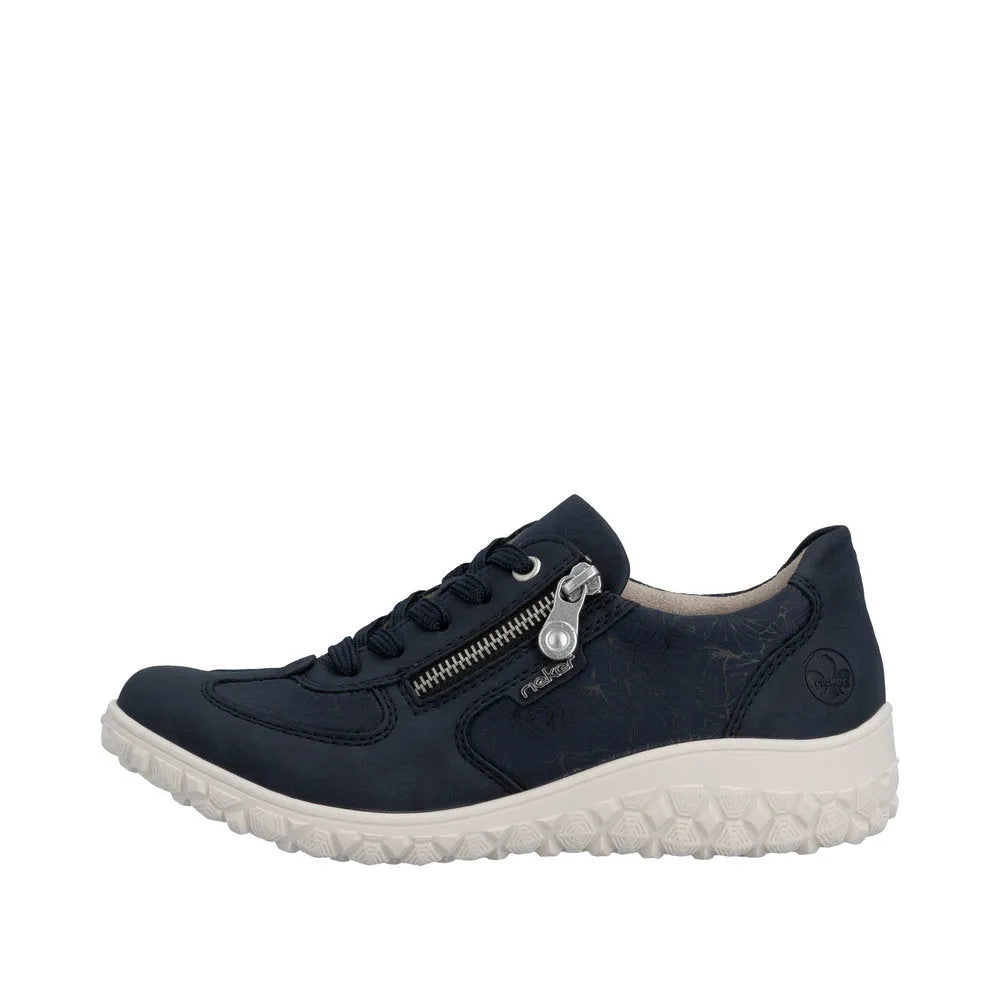 Rieker 59501-14 women's wide navy shoes with lace-up, zip detail, floral pattern, beige interior, white sole, and rounded toe.