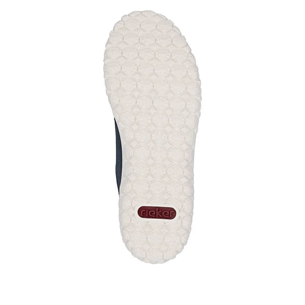 White textured sole with hexagonal pattern, "Rieker" logo in red on the bottom; part of navy blue ladies' wide fit zip and lace shoes.