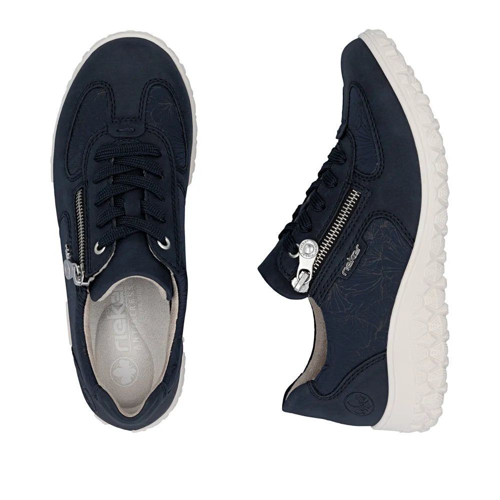 Rieker 59501-14 navy ladies wide fit shoes with zip, lace-up style, floral accents, and white rubber sole.