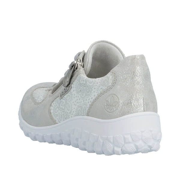 Rieker women's wide fit white and silver sporty shoe with zip, lace-up, textured material, and chunky sole.