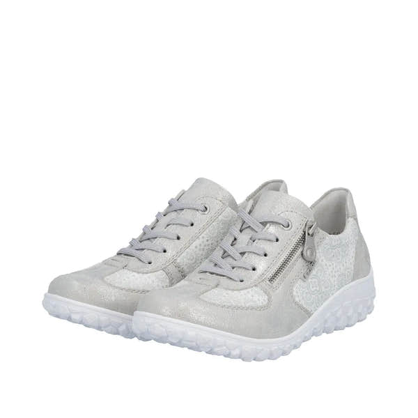 White and silver lace-up shoes with zipper detail, wide fit, made of textured materials, and a chunky white sole.