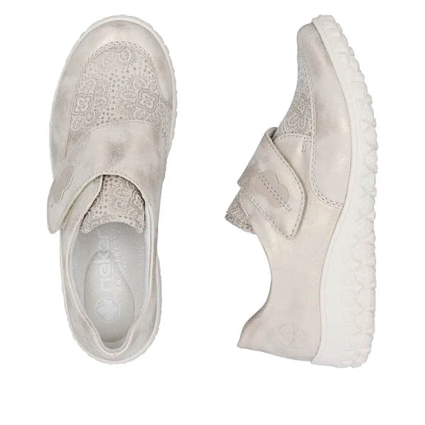 Cream touch fastenings ladies' wide-fit shoes with floral-patterned detailing and cushioned soles.