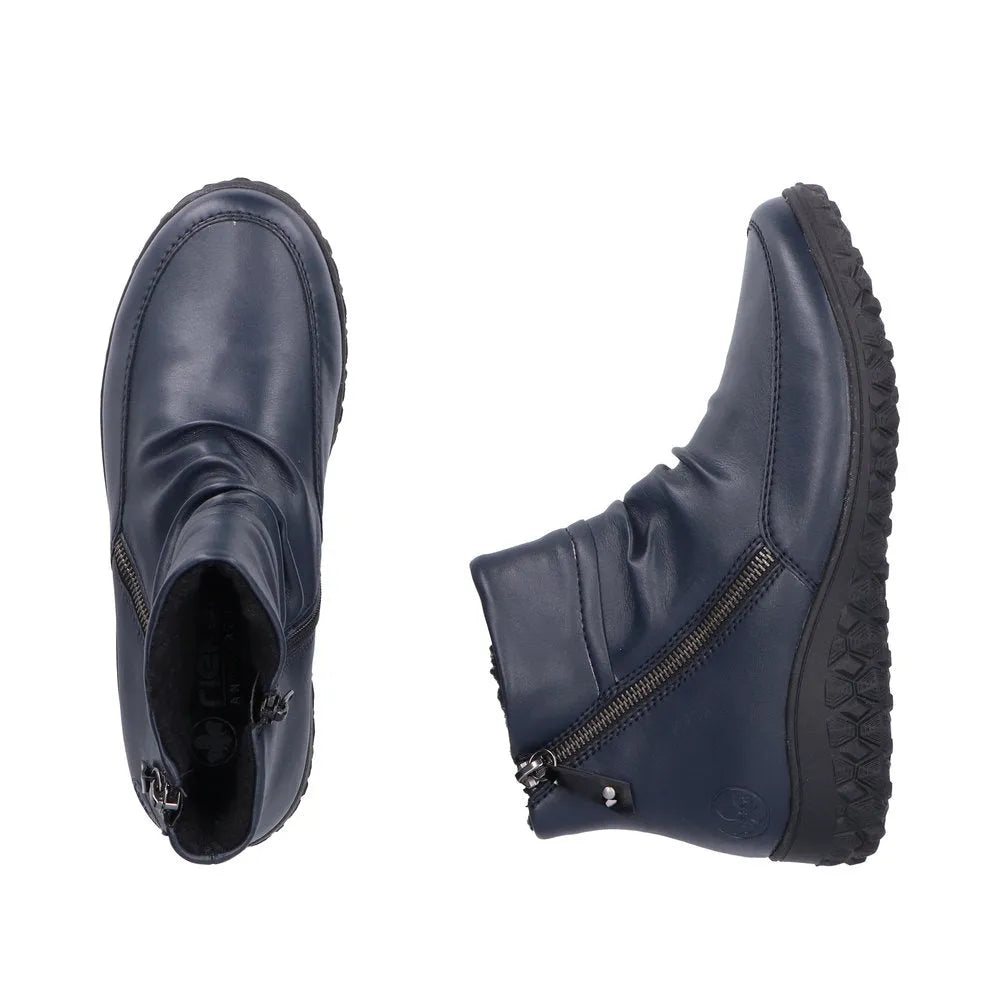 Rieker 59585-14 blue ruched twin zip ankle boots for women with rugged sole and stylish design.