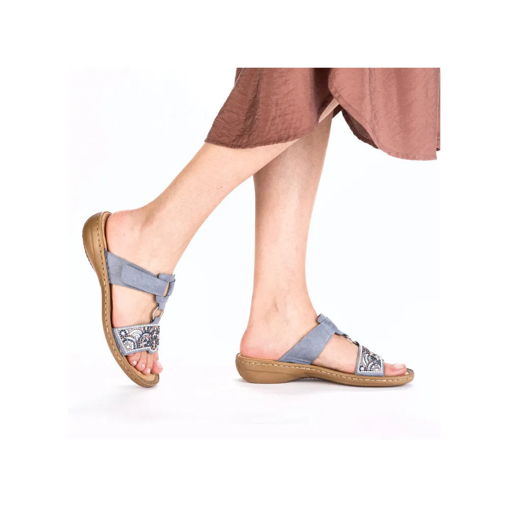 Rieker 608K2-12 ladies blue touch fastening mule sandals with embellished toe straps and cushioned soles.